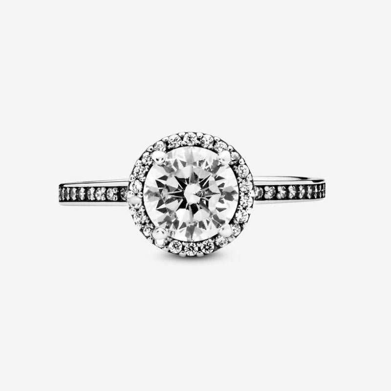 Sparkling light point ring with round stone