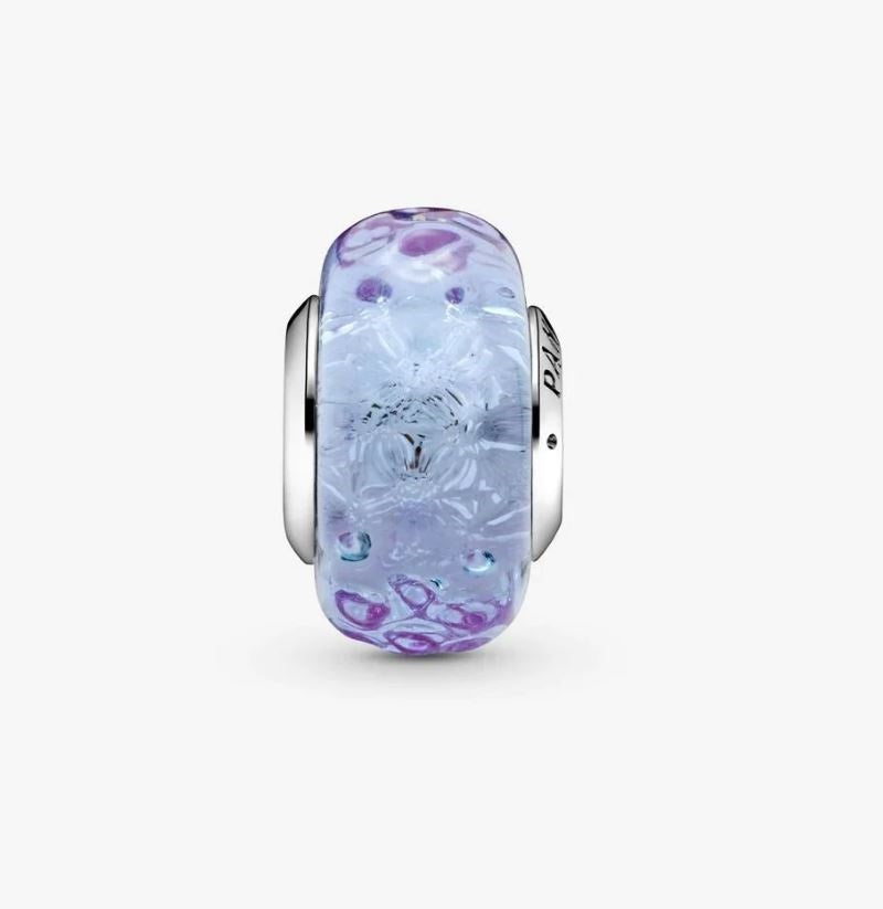 Lavender colored Murano glass charm with waves