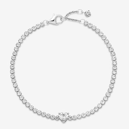 Tennis bracelet with embossed heart