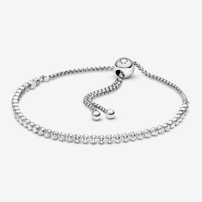 Tennis bracelet with adjustable closure